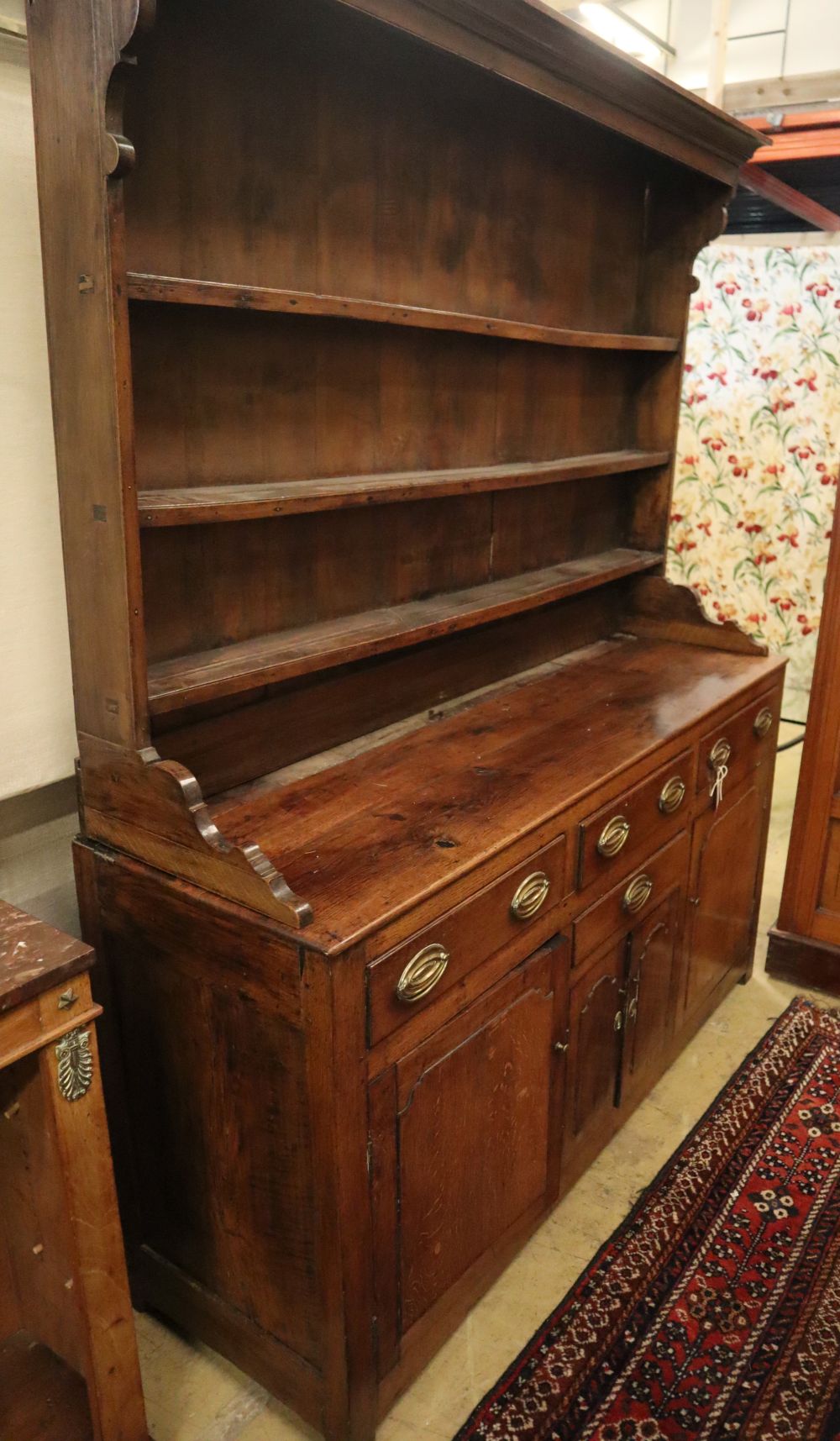 A George III oak dresser, W.160cm, D.48cm, H.197cm